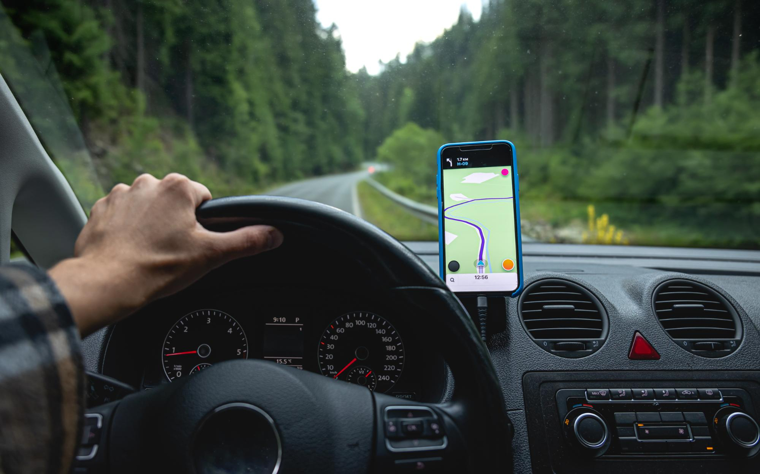 navigator-car-road-forest-area-closeup navigator-car-road-forest-area-closeup